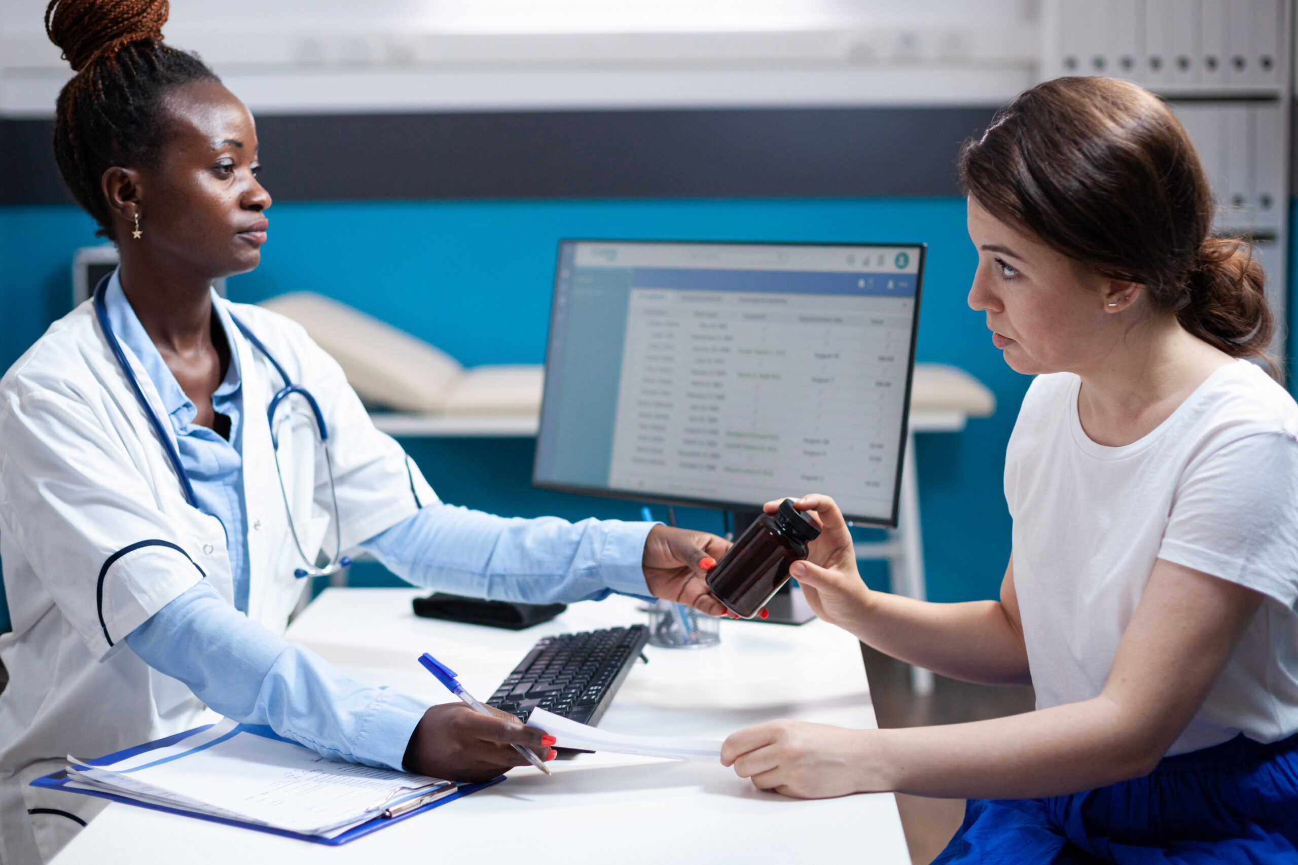 Doctor advising a patient on medication for health treatment and care